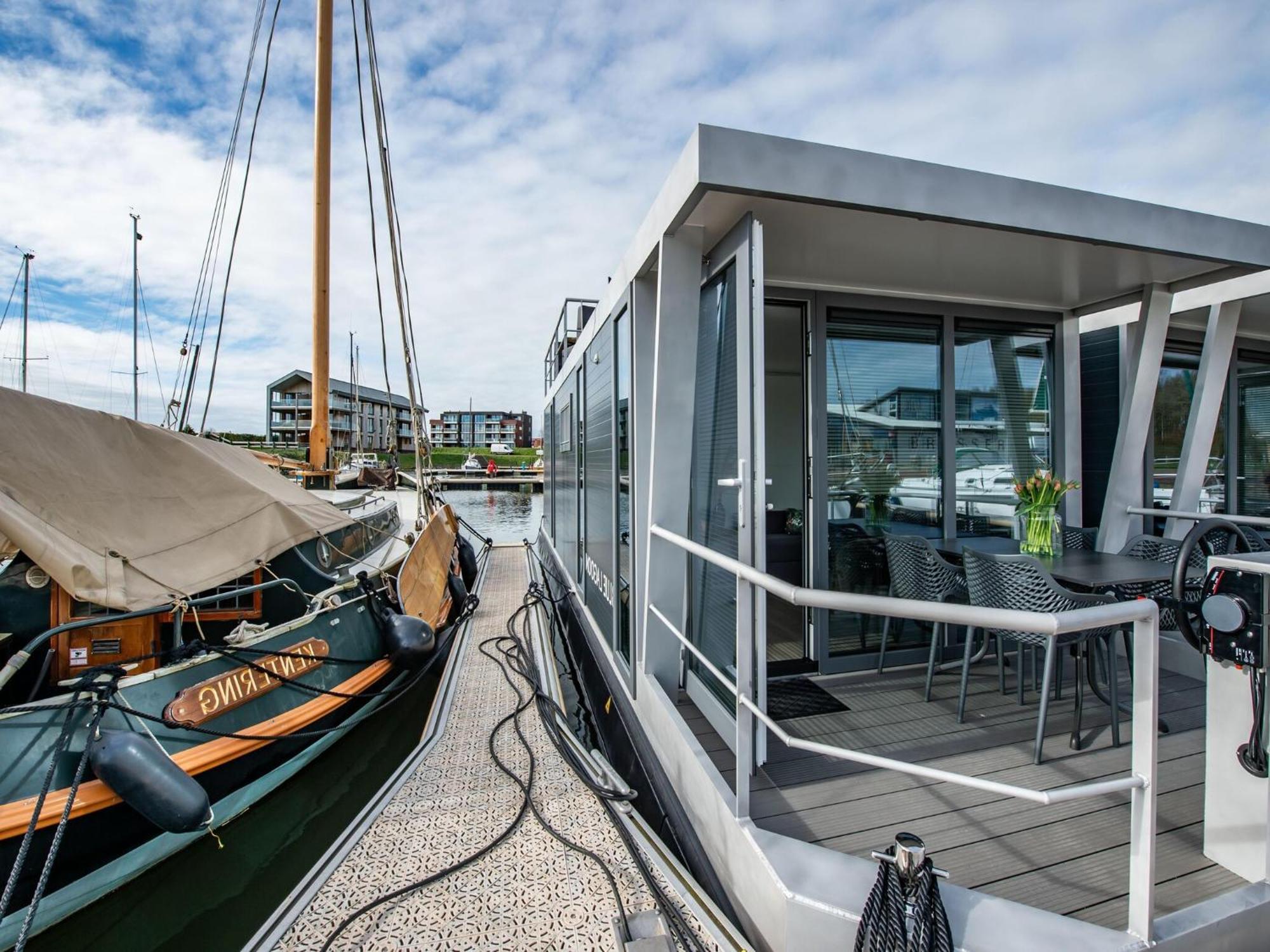 Waterlodge Blue Lagoon On A Jetty For 4 People Kamperland Esterno foto